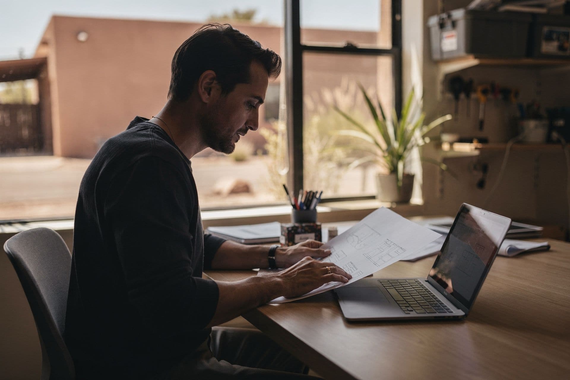 Arizona small business owner taking a moment to review their work