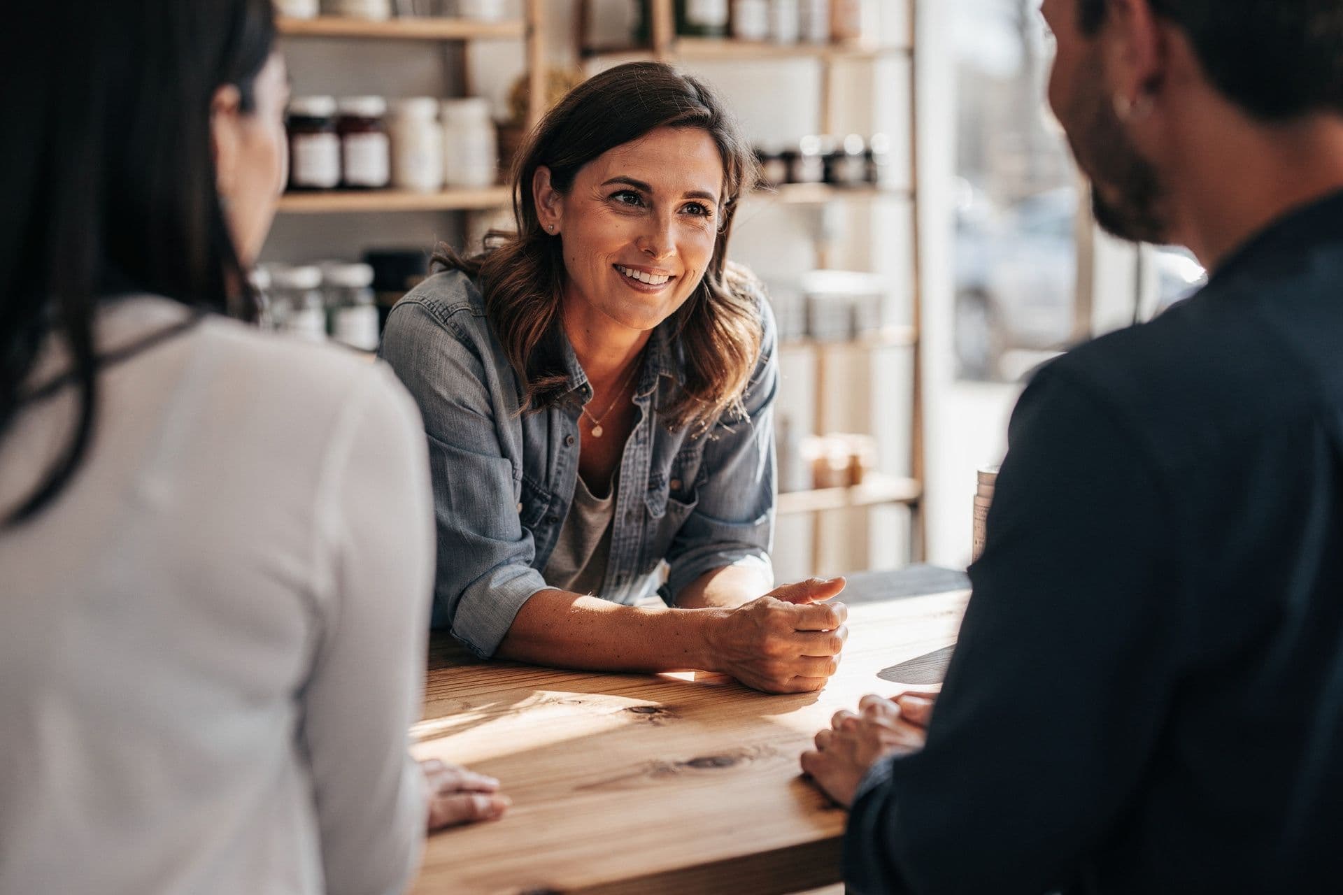 Georgia small business owner woman engaging with customers