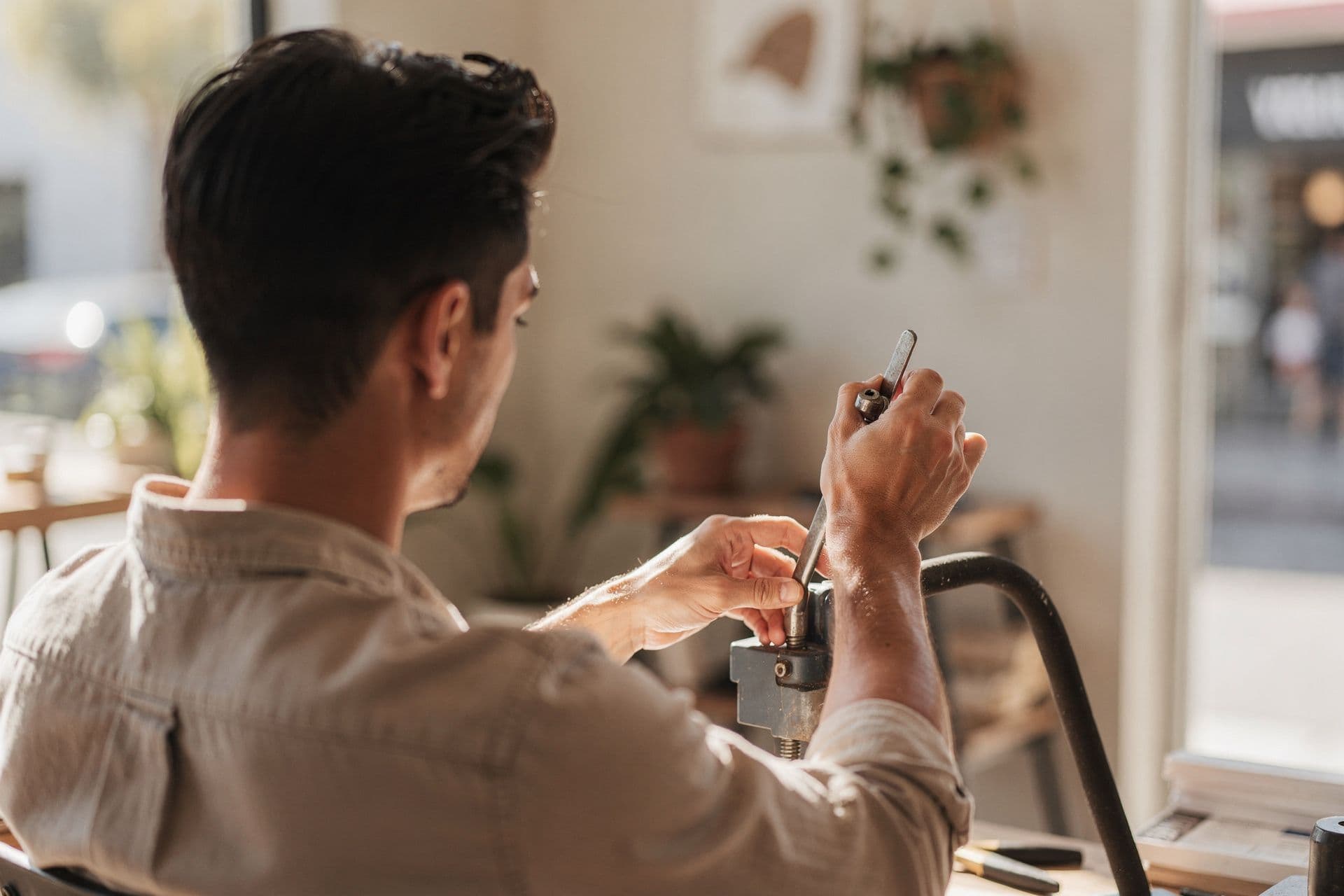 Southern California small business owner taking a moment to review their work