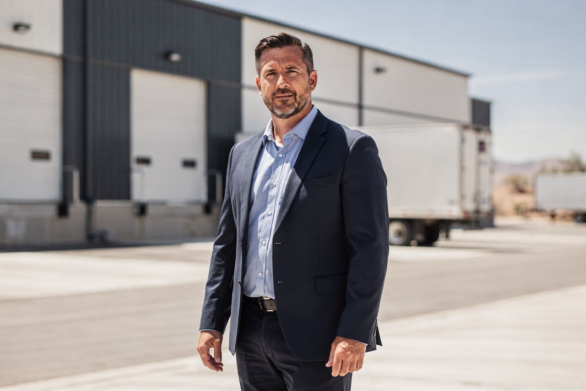 David Xavier, Chief Operating Officer of Frontier Manufacturing Solutions a manufacturing business in Nevada standing with a composed expression