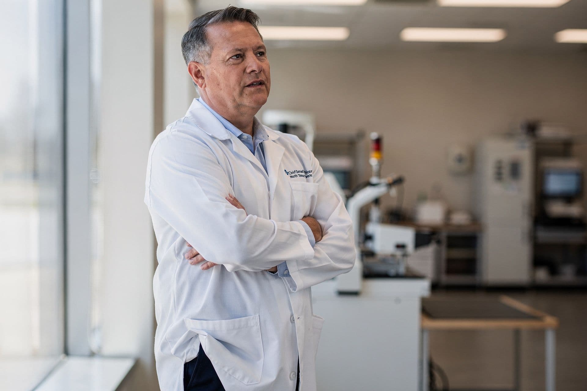 Patrick Warren, Chief Medical Officer and Founder of Kessler Medical Group a healthcare business in North Texas standing at ease